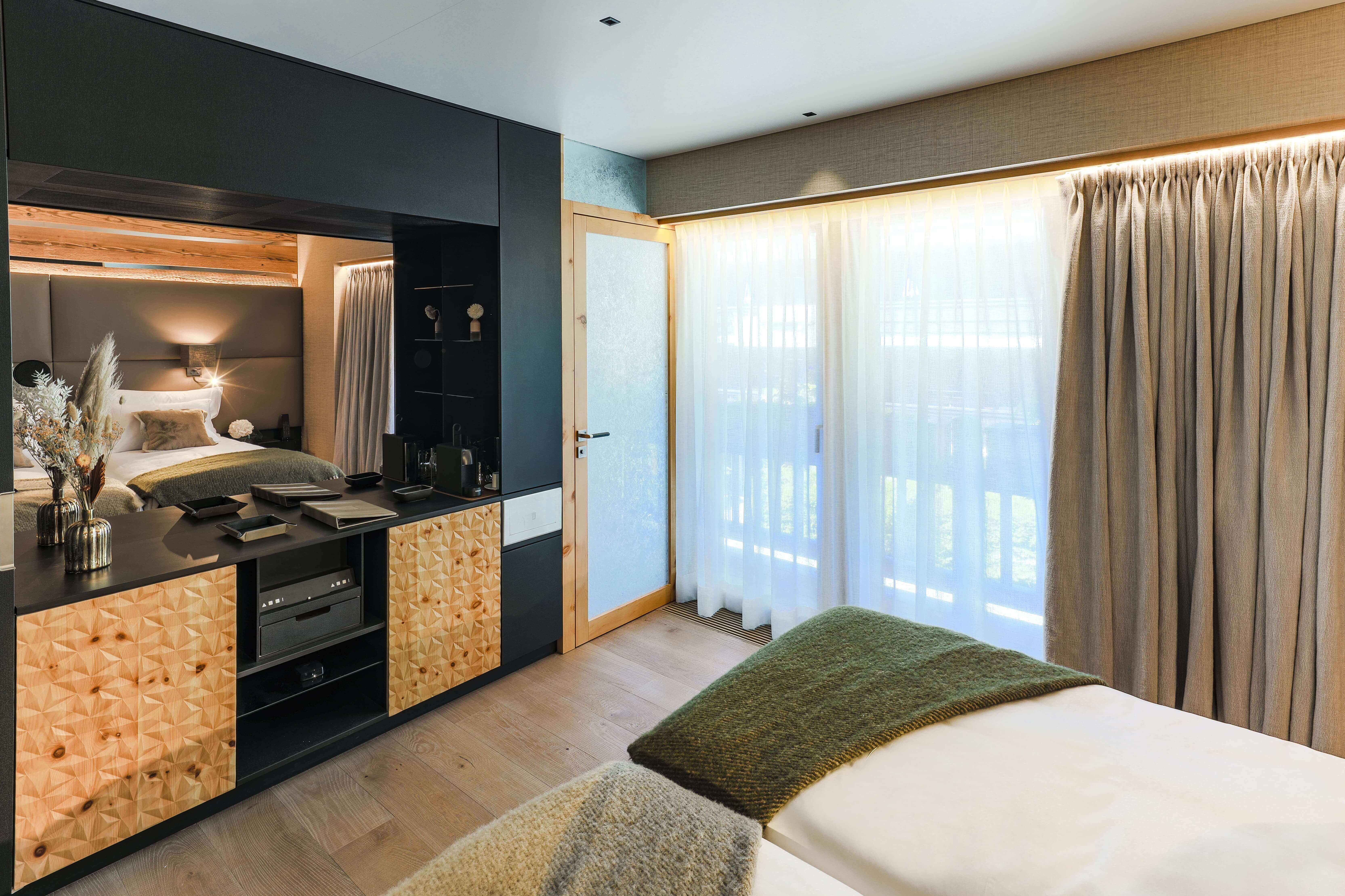 Au Club Alpin - Luxury ski hotel gallery image 4 showing alpine architecture, interior design, or mountain views