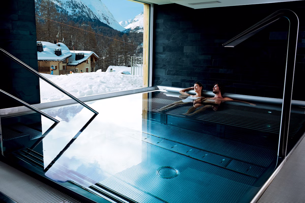 Nira Alpina - Luxury ski hotel gallery image 11 showing alpine architecture, interior design, or mountain views