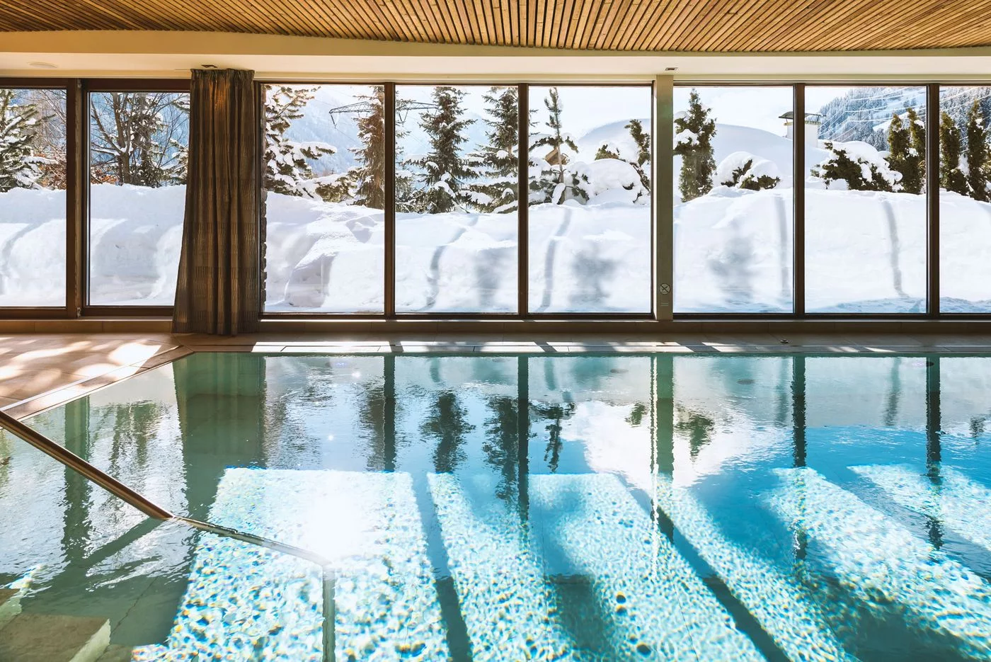 Hotel Tannenhof - Luxury ski hotel gallery image 4 showing alpine architecture, interior design, or mountain views