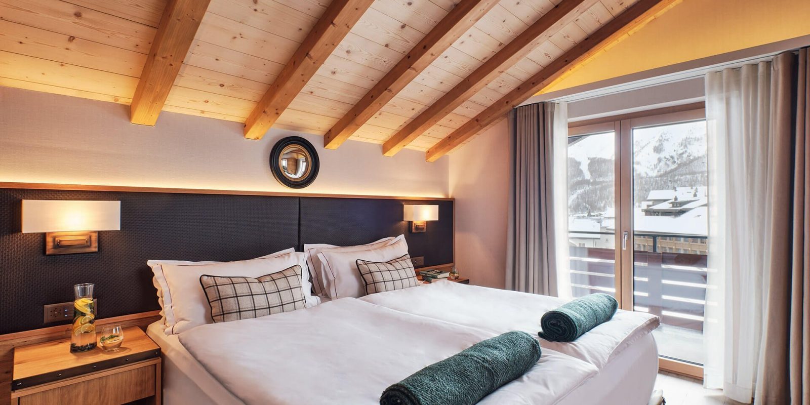 The Capra Hotel - Luxury ski hotel gallery image 4 showing alpine architecture, interior design, or mountain views