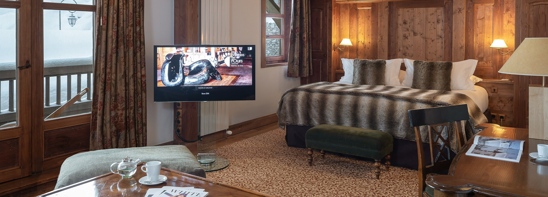 Les Barmes de l’Ours - Luxury ski hotel gallery image 10 showing alpine architecture, interior design, or mountain views