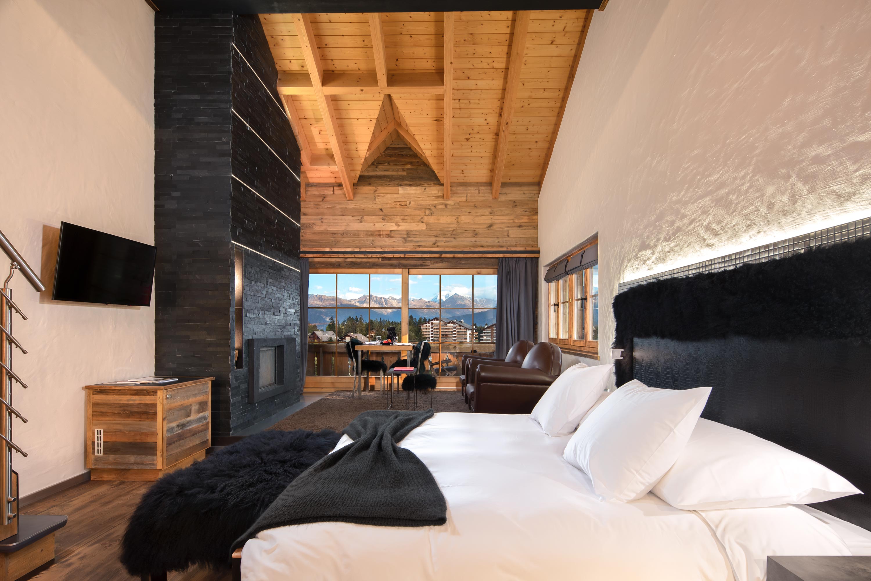 Hostellerie du Pas de l’Ours - Luxury ski hotel gallery image 16 showing alpine architecture, interior design, or mountain views