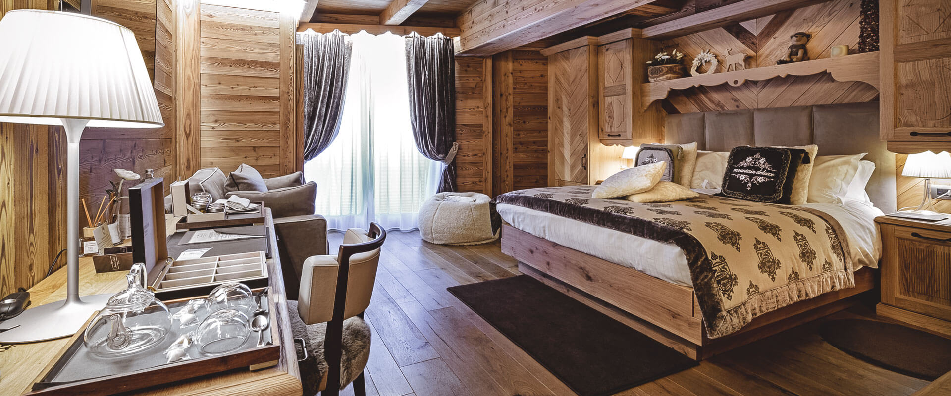 Fiocco di Neve Relais & Spa - Luxury ski hotel gallery image 28 showing alpine architecture, interior design, or mountain views