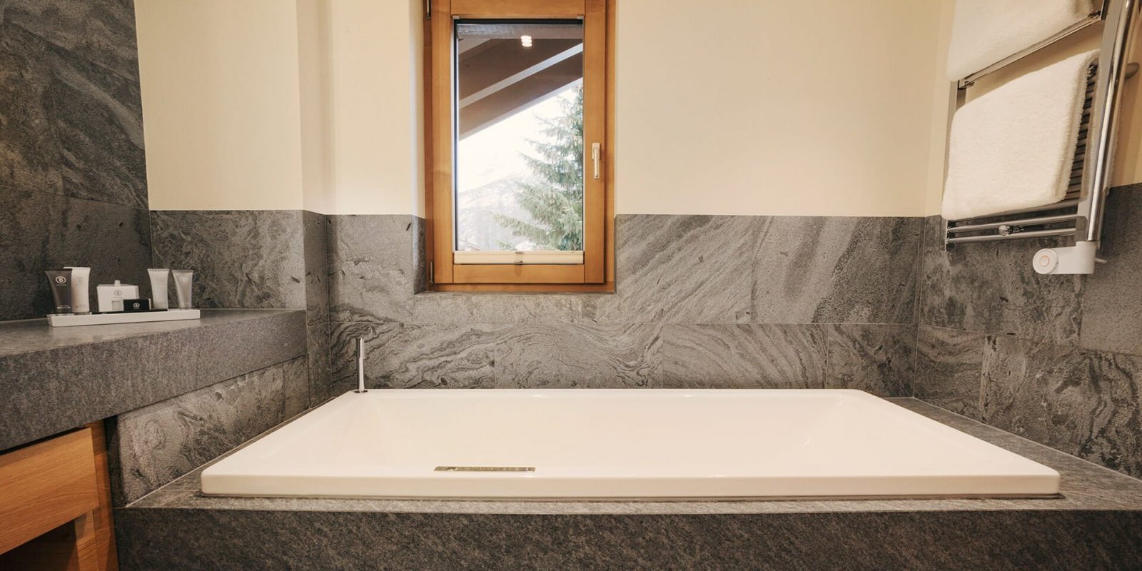 The Capra Hotel - Luxury ski hotel gallery image 12 showing alpine architecture, interior design, or mountain views