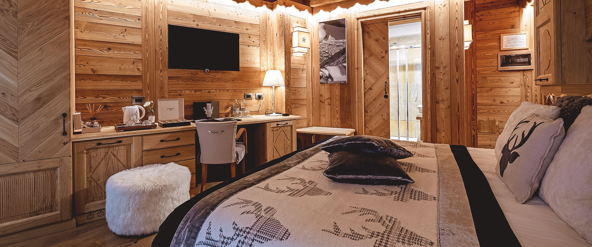 Fiocco di Neve Relais & Spa - Luxury ski hotel gallery image 31 showing alpine architecture, interior design, or mountain views