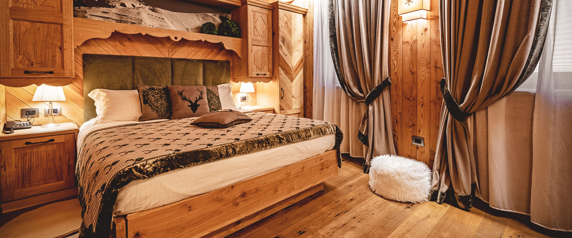 Fiocco di Neve Relais & Spa - Luxury ski hotel gallery image 4 showing alpine architecture, interior design, or mountain views