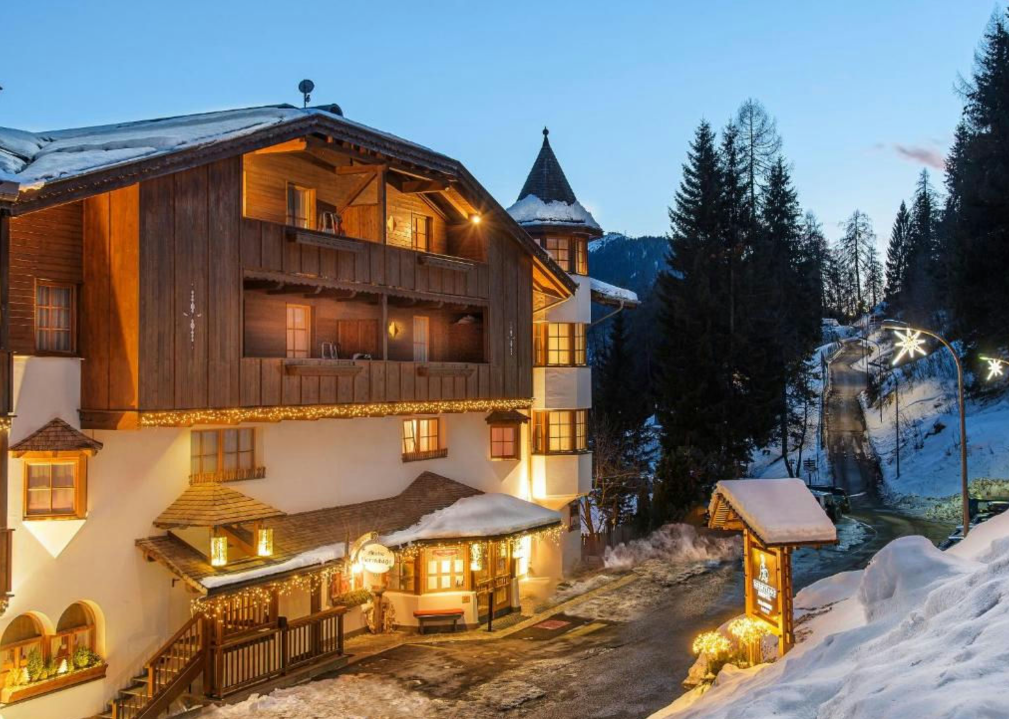Biohotel Hermitage - Luxury ski hotel gallery image 2 showing alpine architecture, interior design, or mountain views