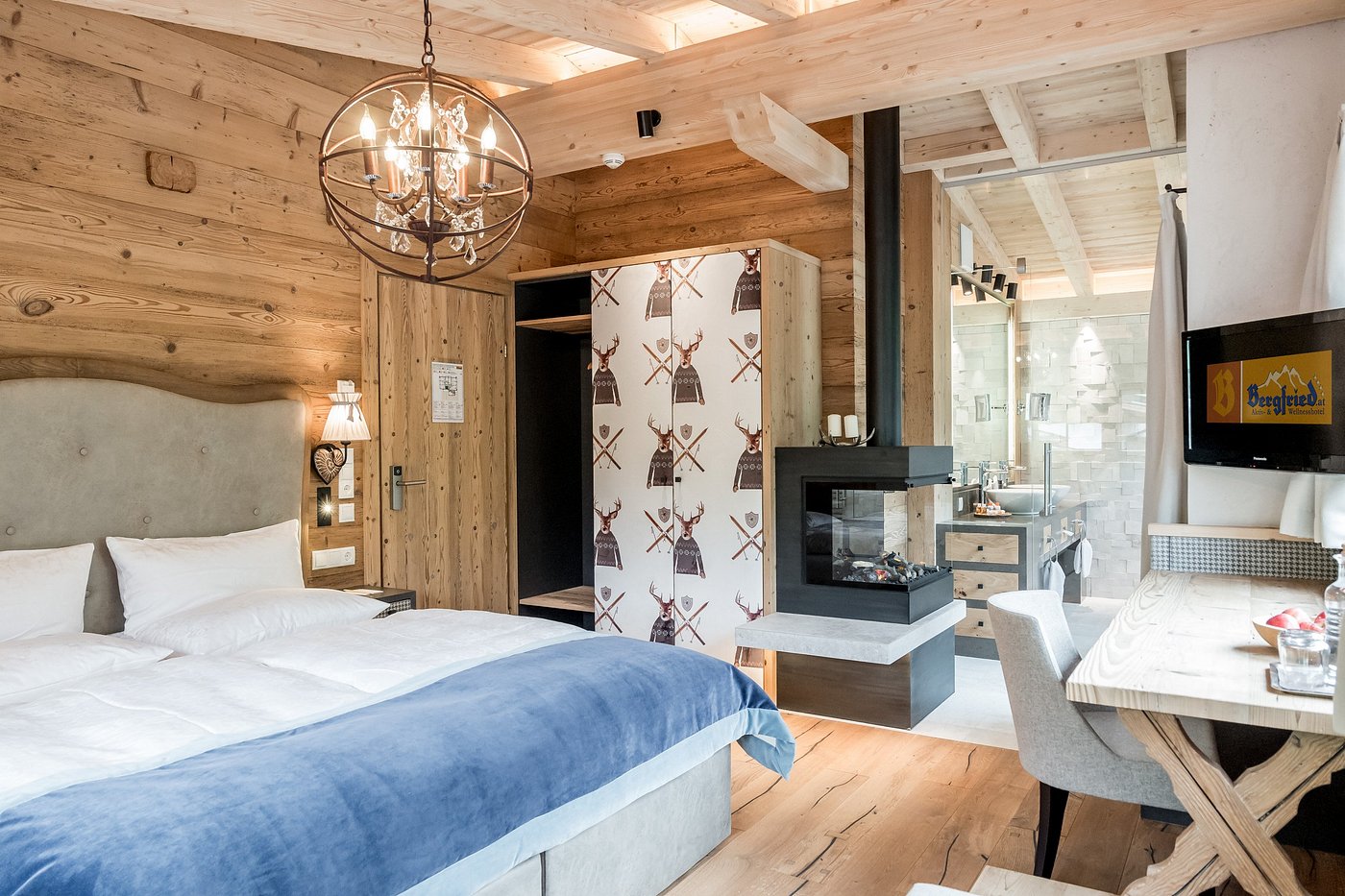 Aktiv & Wellnesshotel Bergfried - Luxury ski hotel gallery image 7 showing alpine architecture, interior design, or mountain views