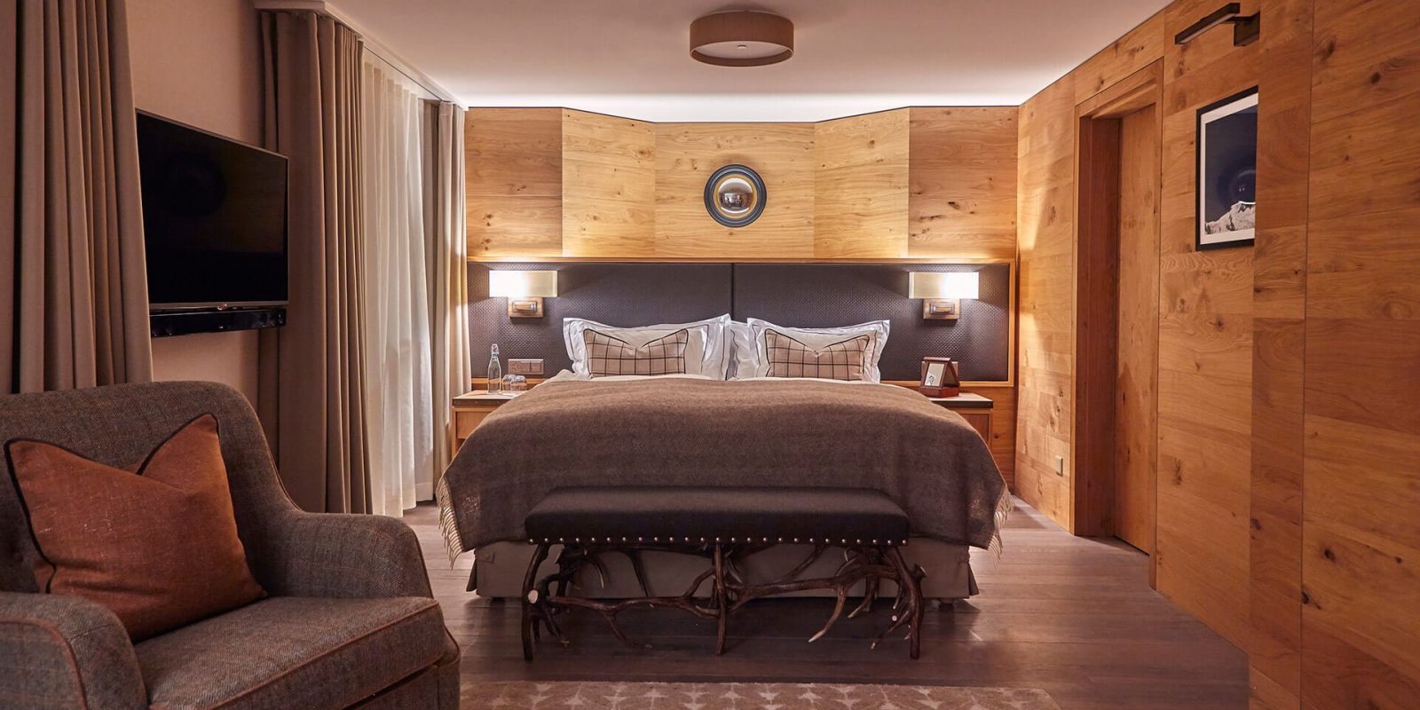 The Capra Hotel - Luxury ski hotel gallery image 9 showing alpine architecture, interior design, or mountain views