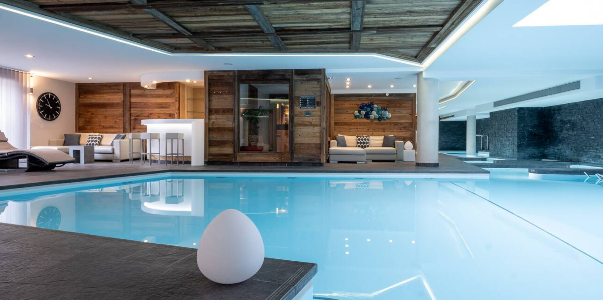 Le Kaïla - Luxury ski hotel gallery image 5 showing alpine architecture, interior design, or mountain views