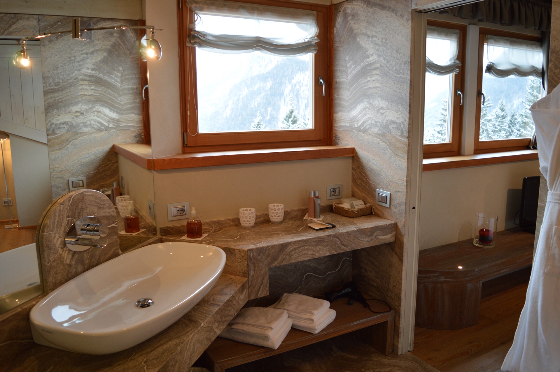 Biohotel Hermitage - Luxury ski hotel gallery image 8 showing alpine architecture, interior design, or mountain views
