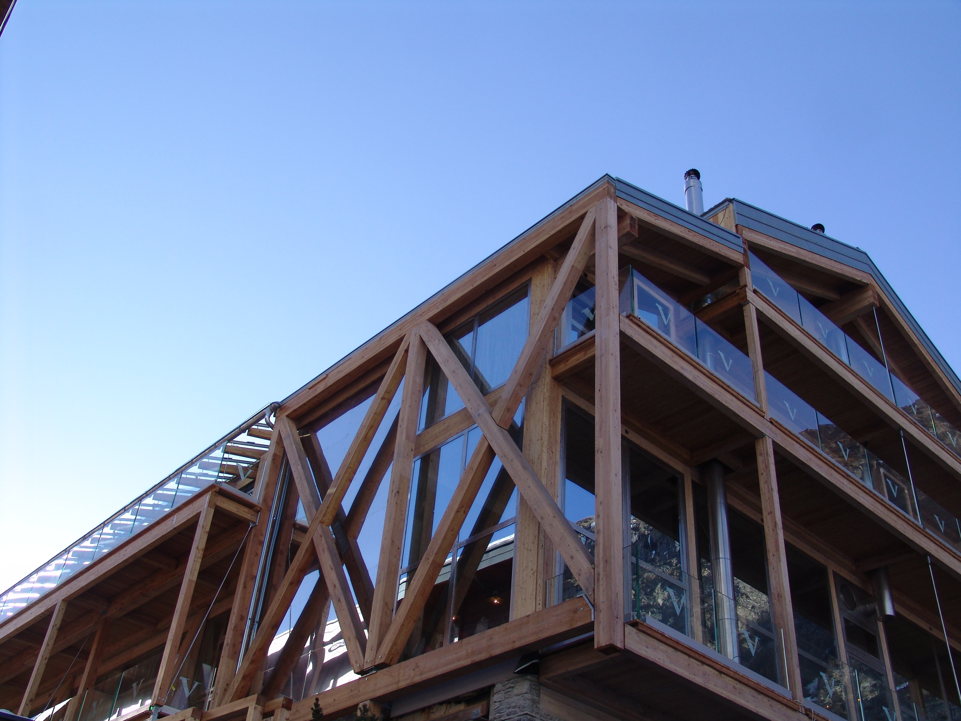 Backstage Hotel Vernissage - Luxury ski hotel gallery image 2 showing alpine architecture, interior design, or mountain views