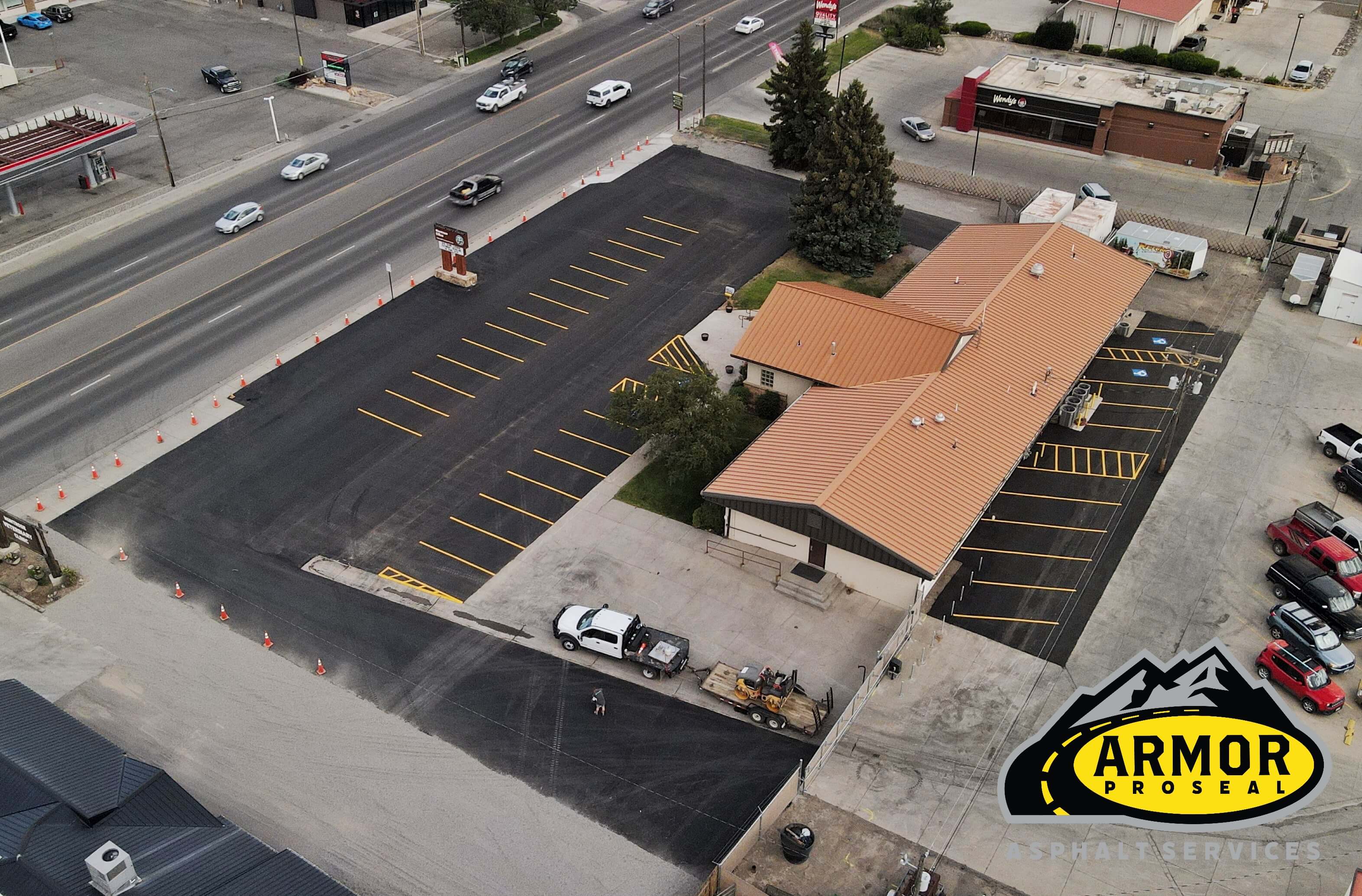 Residential street maintenance in Silt, CO, with Armor Proseal crew performing preventative repairs that extend pavement life and improve neighborhood infrastructure.