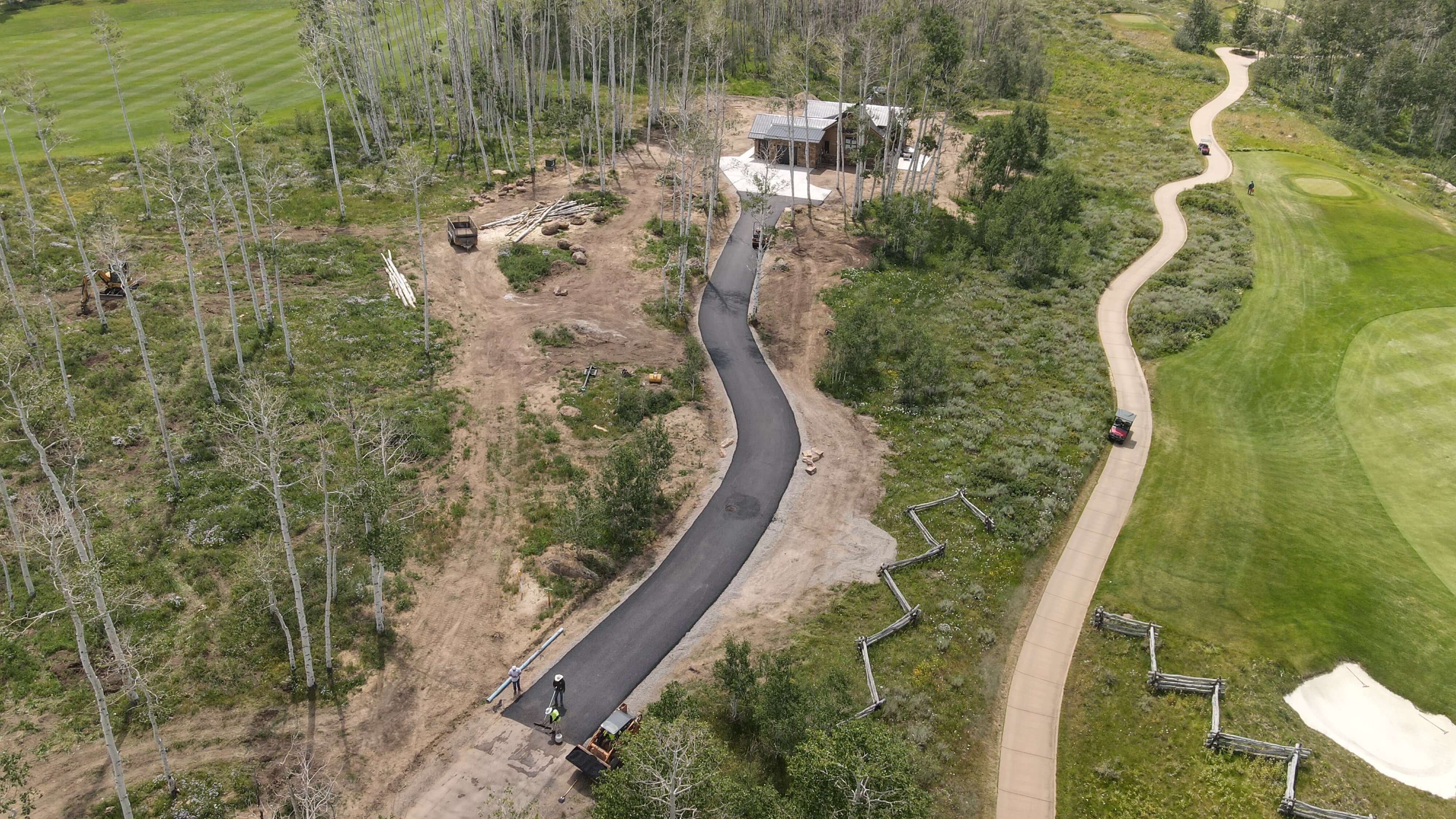 Industrial facility access road paving in Rangely, CO, showcasing Armor Proseal's ability to create heavy-duty asphalt surfaces for commercial and industrial applications.