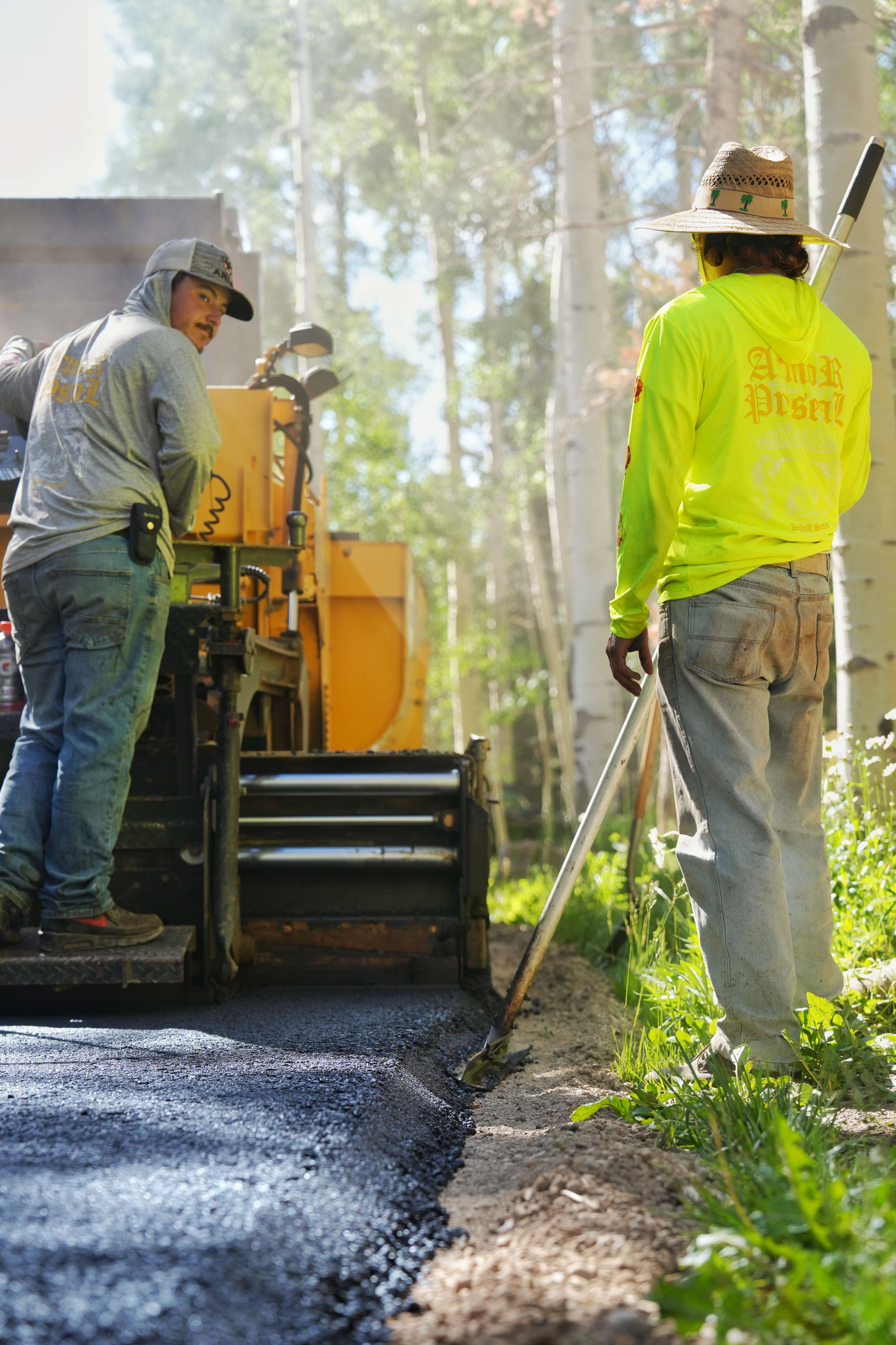 Community center parking lot repair in Naturita, CO, with Armor Proseal crew addressing surface damage and improving safety with professional asphalt maintenance techniques.