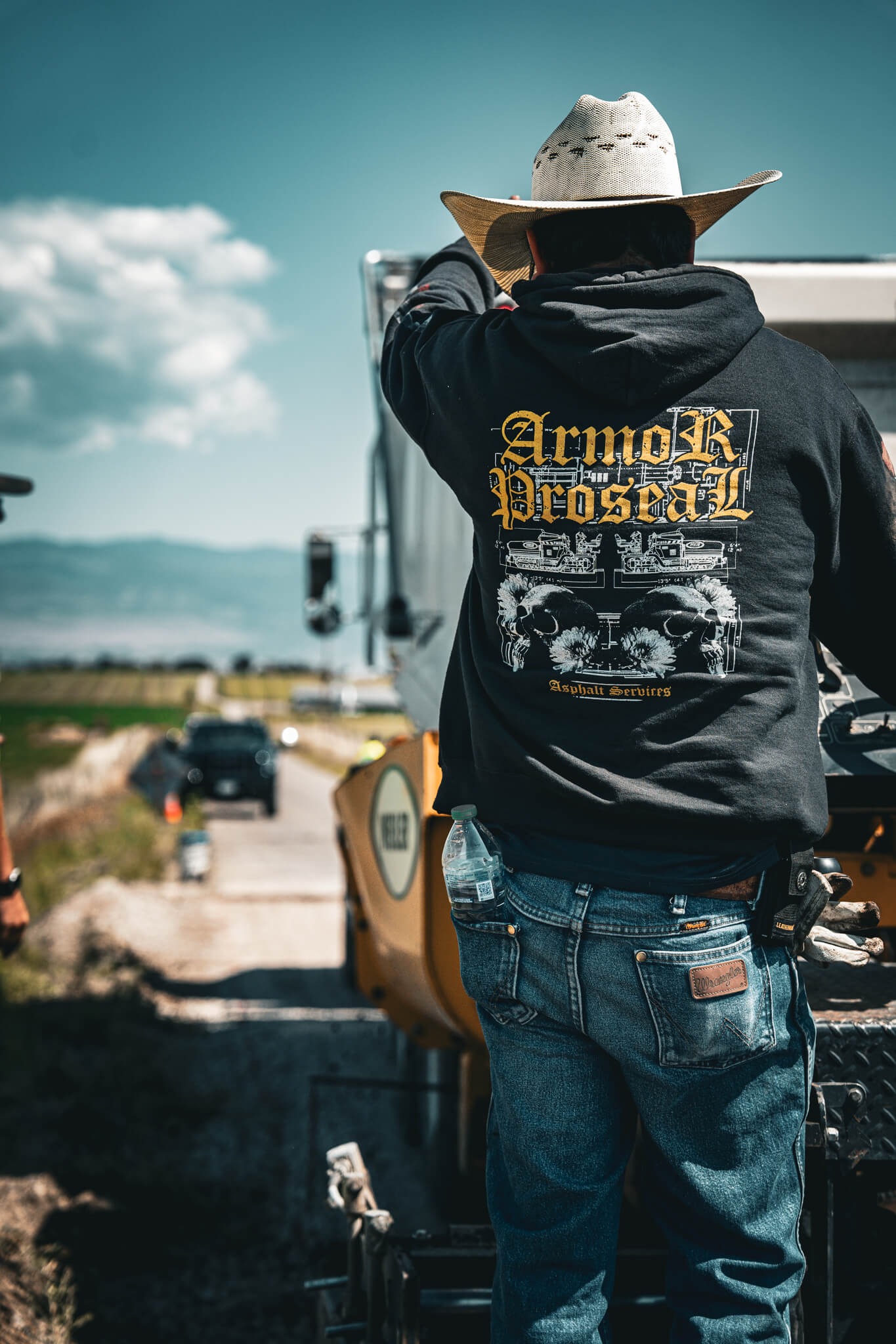 School zone asphalt maintenance in Mancos, CO, with Armor Proseal crew enhancing safety and appearance of educational facility access areas with professional techniques.