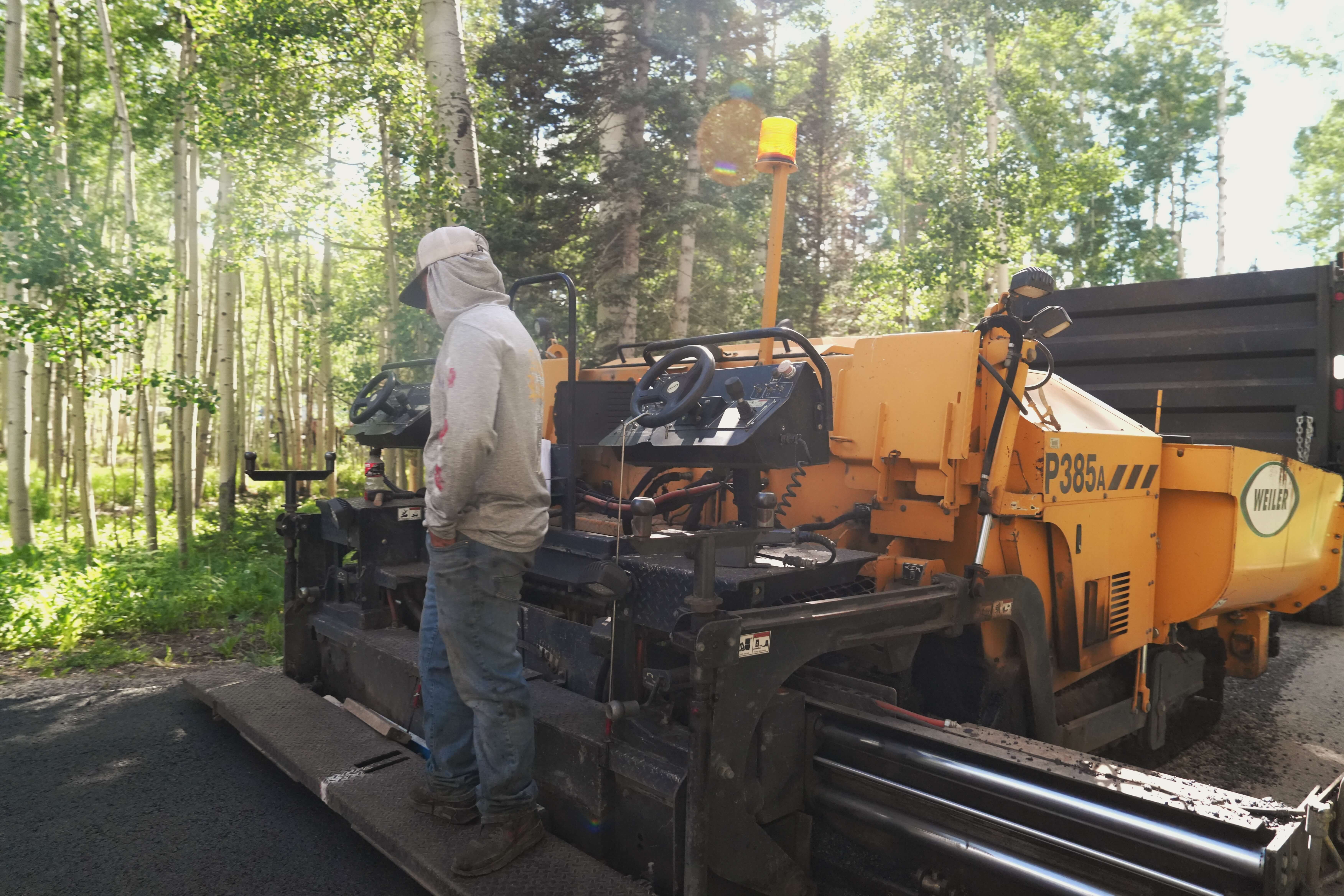 Fresh asphalt parking lot installation for a small business in Paonia, CO, showcasing Armor Proseal's ability to enhance commercial properties with professional paving solutions.