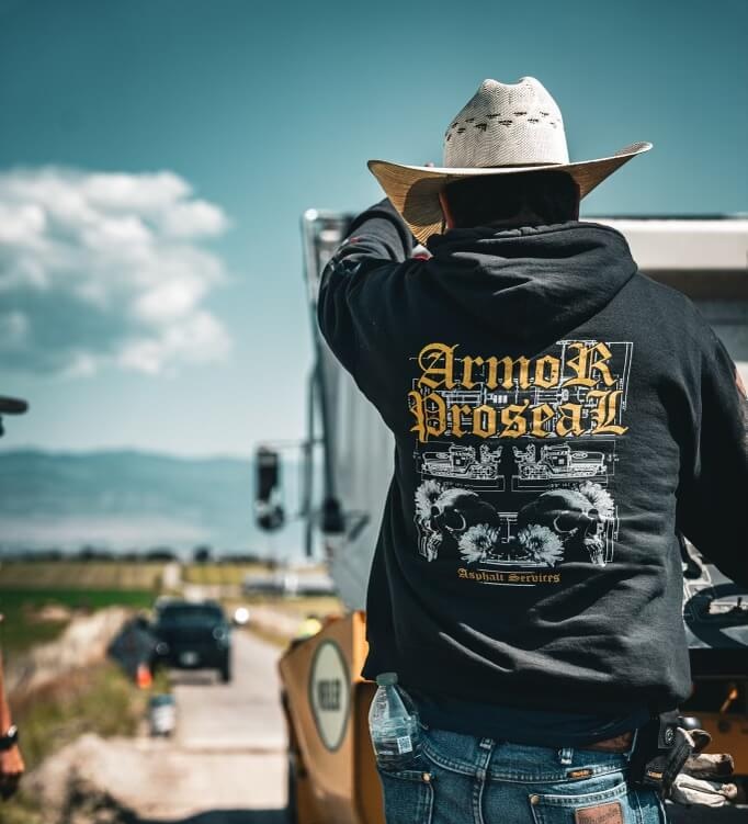 School facility access and parking in Ferron, UT, with Armor Proseal crews installing educational infrastructure with safe, durable asphalt surfaces for students and staff.