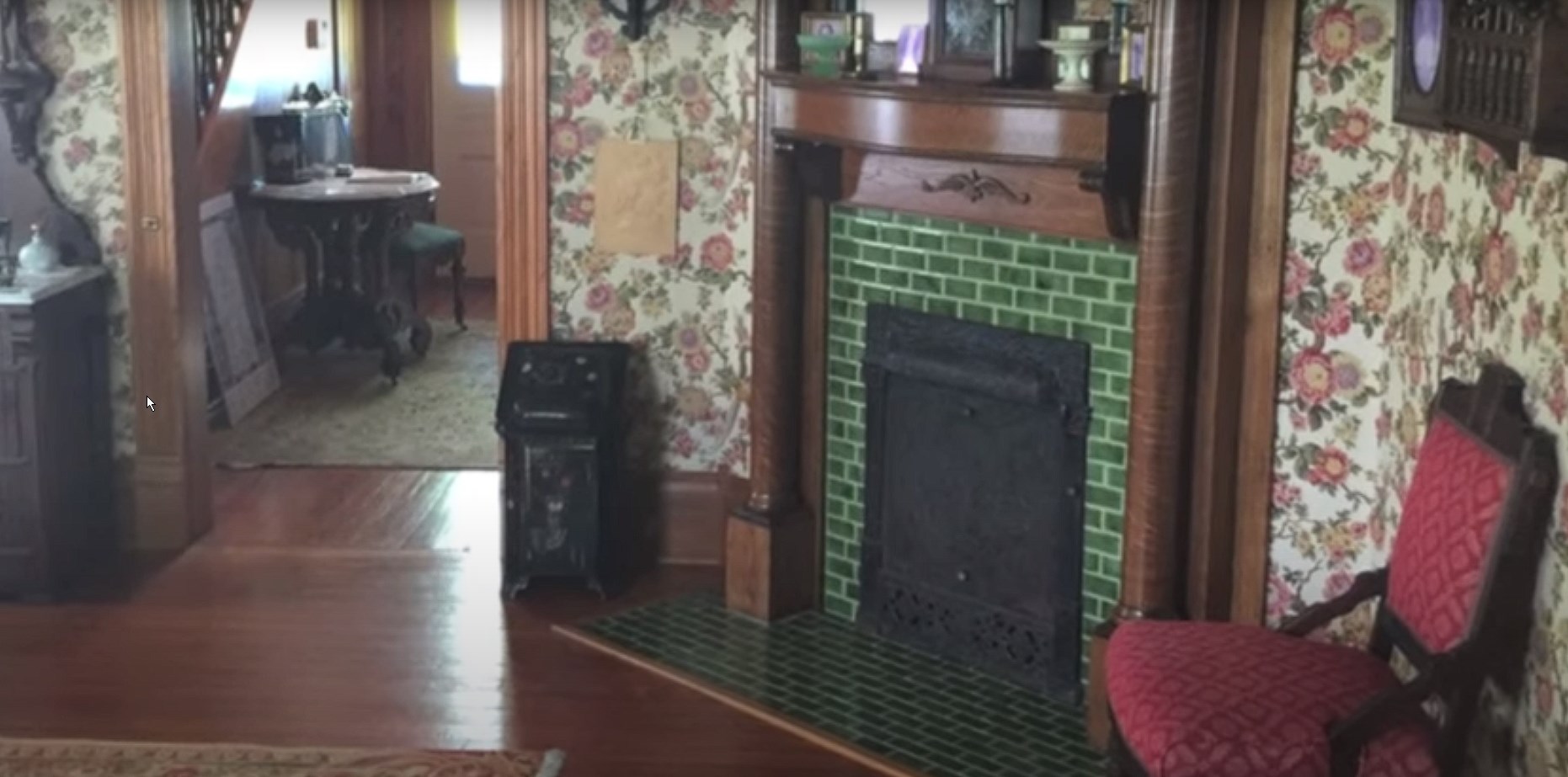 Green tile fireplace at the Bayless Selby House Museum in Denton, TX
