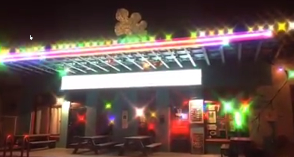 Back patio of Dan's Silverleaf with seating and lighting in Denton, TX