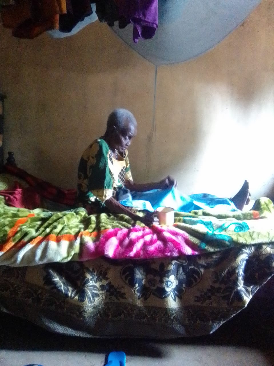 Seat toilet for disable OLD women who move by crawling-in Siaya County Kenya.