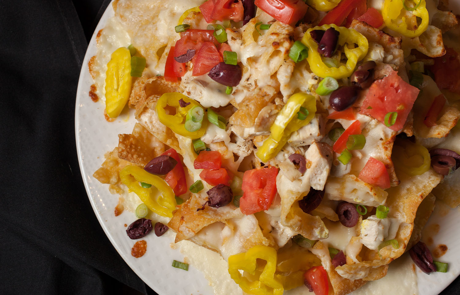 Come to Addison's for their famous nachos in Columbia, MO.