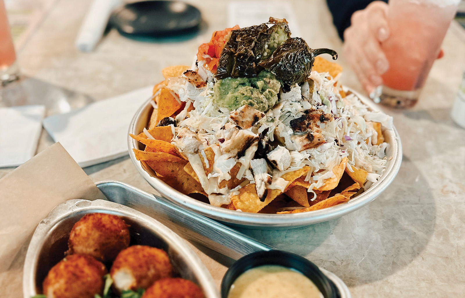 Try 44 Tavern's Moutwatering Burgers & Fries at Midway Golf & Games.