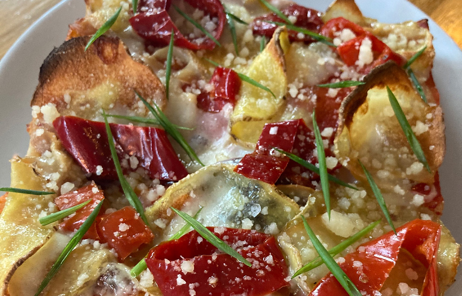 Try an Authentic Pizza With Toppings Like Prosciutto & Fresh Basil at Endwell Taverna in Columbia, MO.