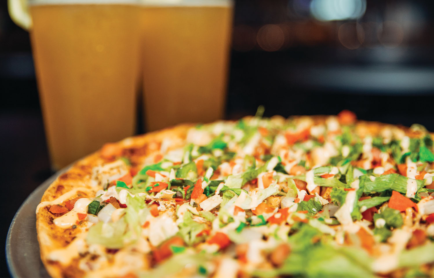 Visit Deuce Pub & Pit for pizza and drinks in Columbia, MO.