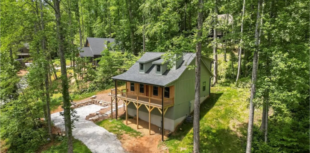 Exterior view of a completed residential home construction project by Foothills Construction and Restoration Services in Black Mountain, North Carolina. Call (828) 537-4457.