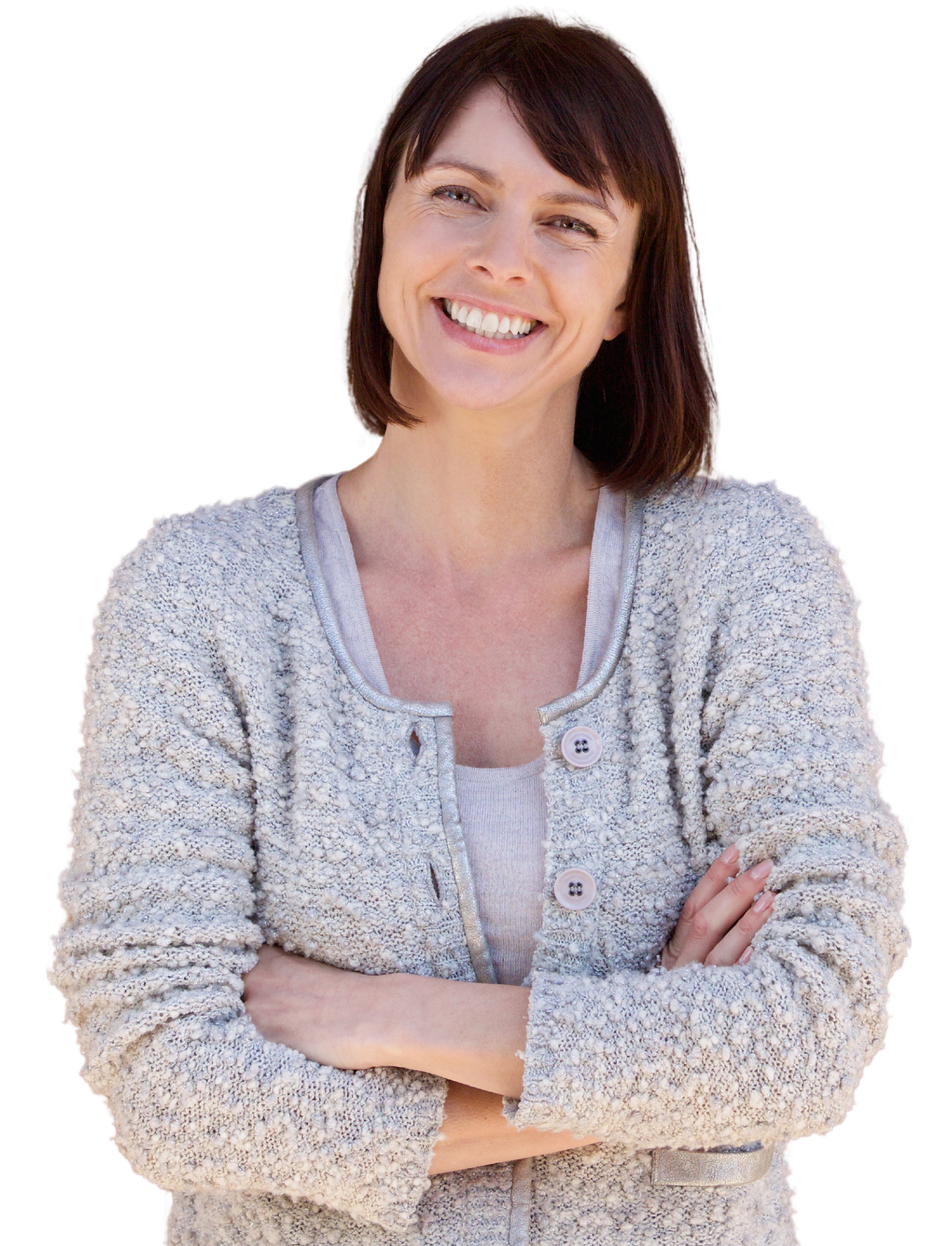 A woman in a white shirt is smiling with her hand on her chin