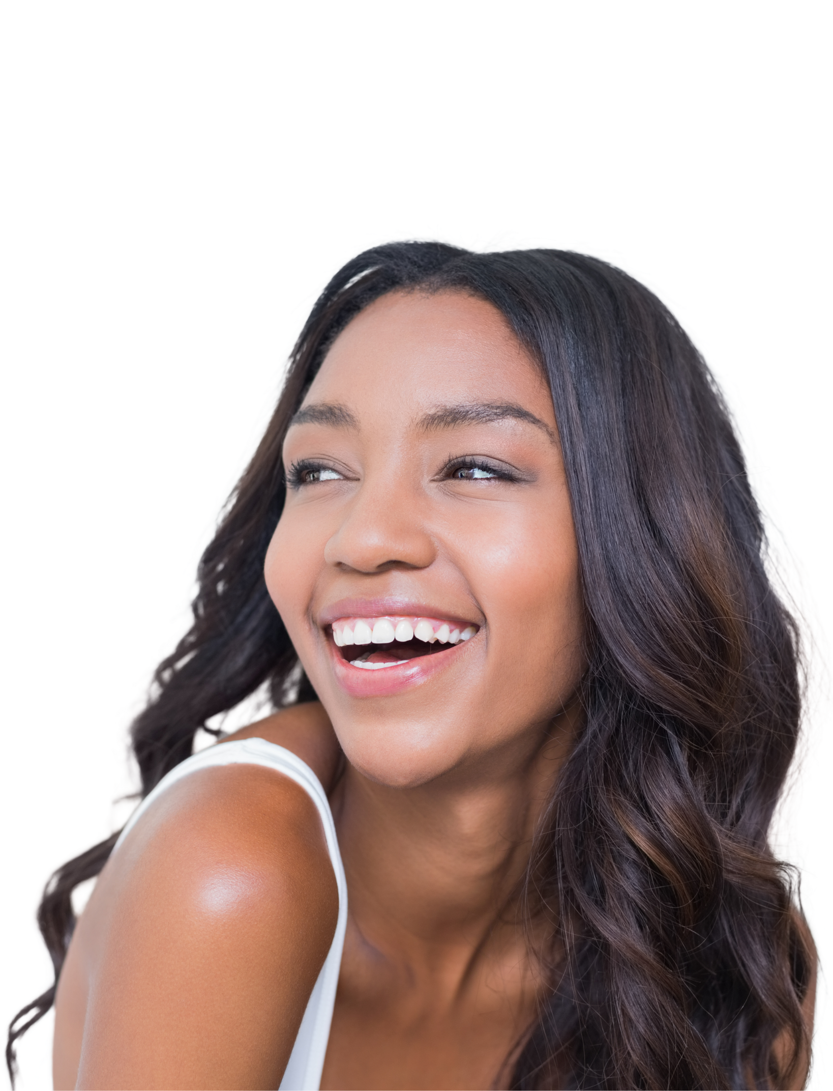 A woman in a white shirt is smiling with her hand on her chin