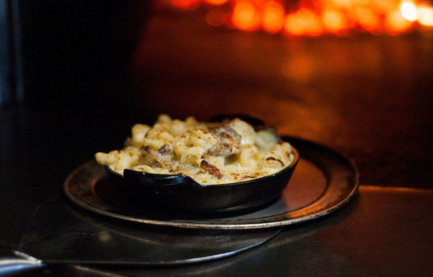 One of the newer restaurants in Columbia, MO, Flyover brings a unique flare to the Midwest. With a farm-to-table approach, the chefs at Flyover design unique meals around seasonal food while staying true to their roots of Midwest flavor. Centered around a wood fire stone oven, Flyover creates one-of-a-kind meals you can't get enough of.