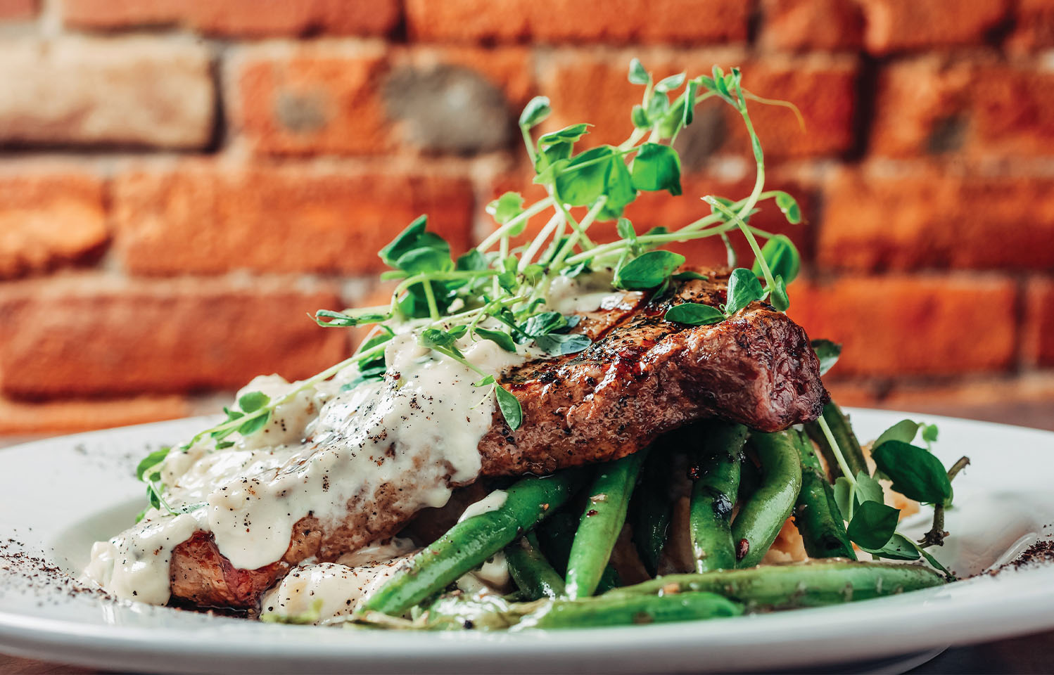 Enjoy a fine-dining atmosphere at Teller's Gallery & Bar in Columbia, MO.