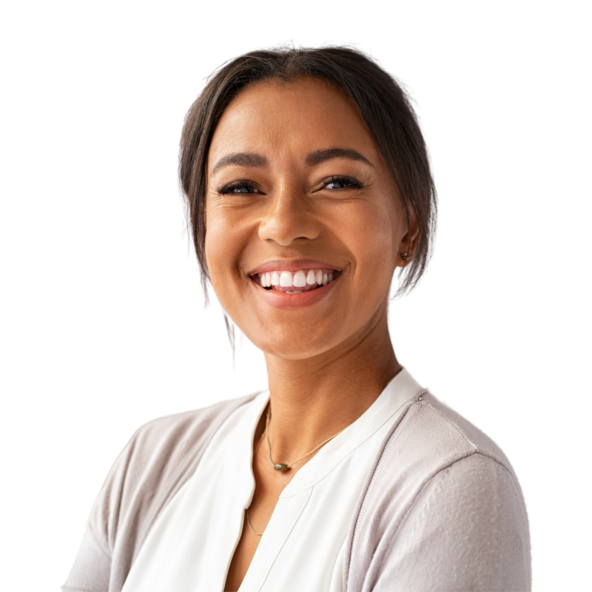 A woman with long hair is smiling with her hands on her face.