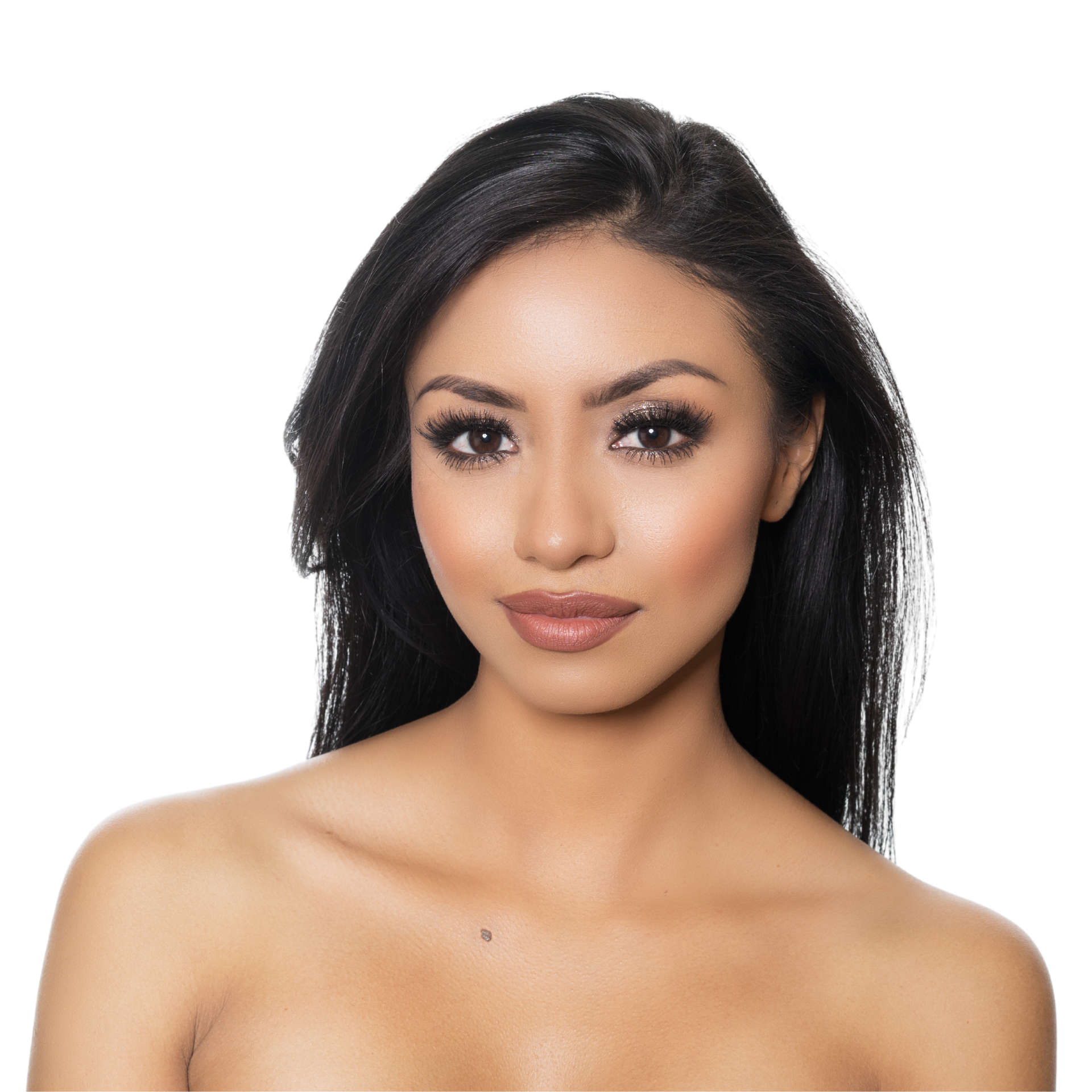 A woman with long hair is smiling with her hands on her face.