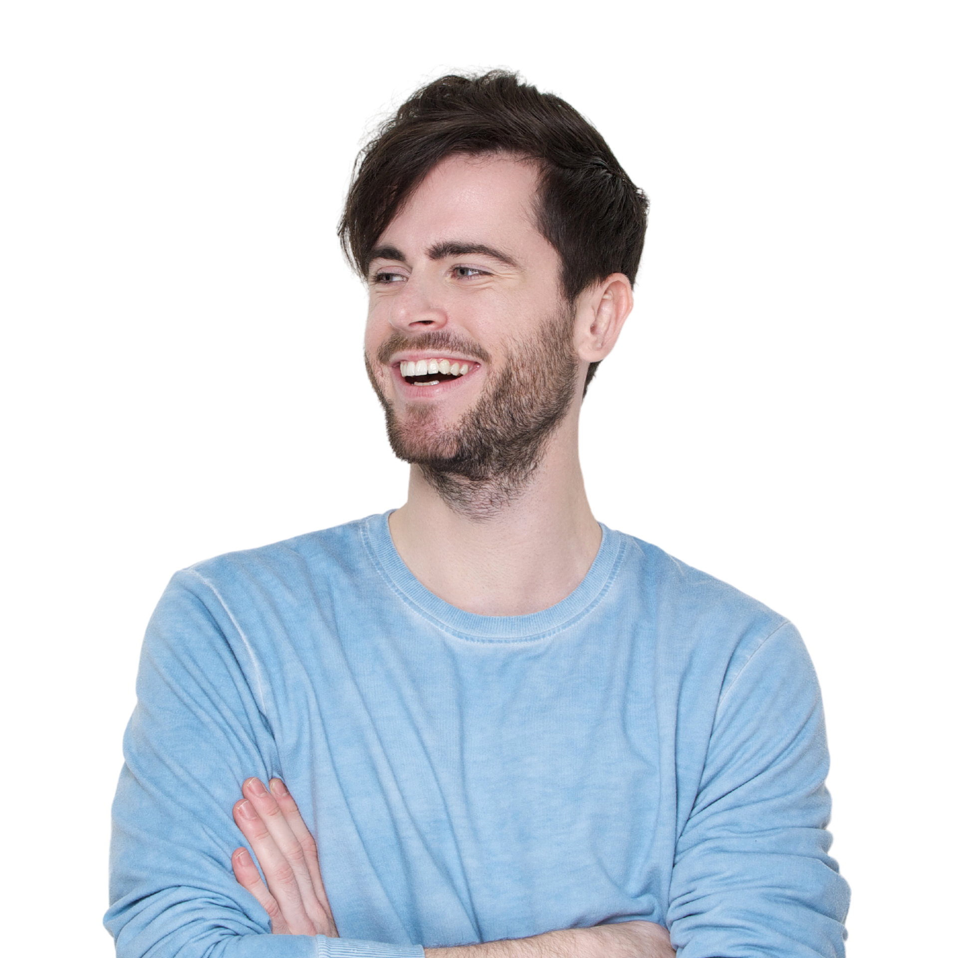 A woman with long hair is smiling with her hands on her face.