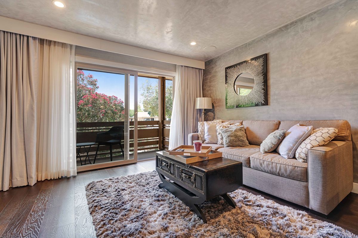 Bright Living Room Open to Balcony