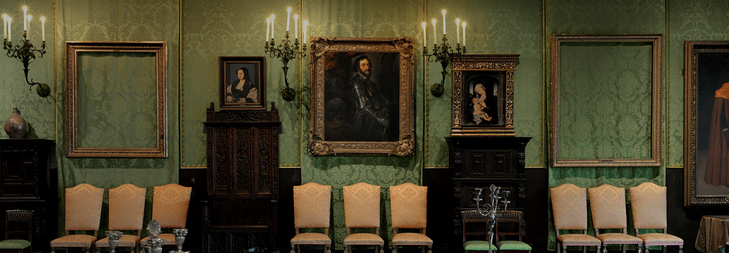 antique art hanging in stately home