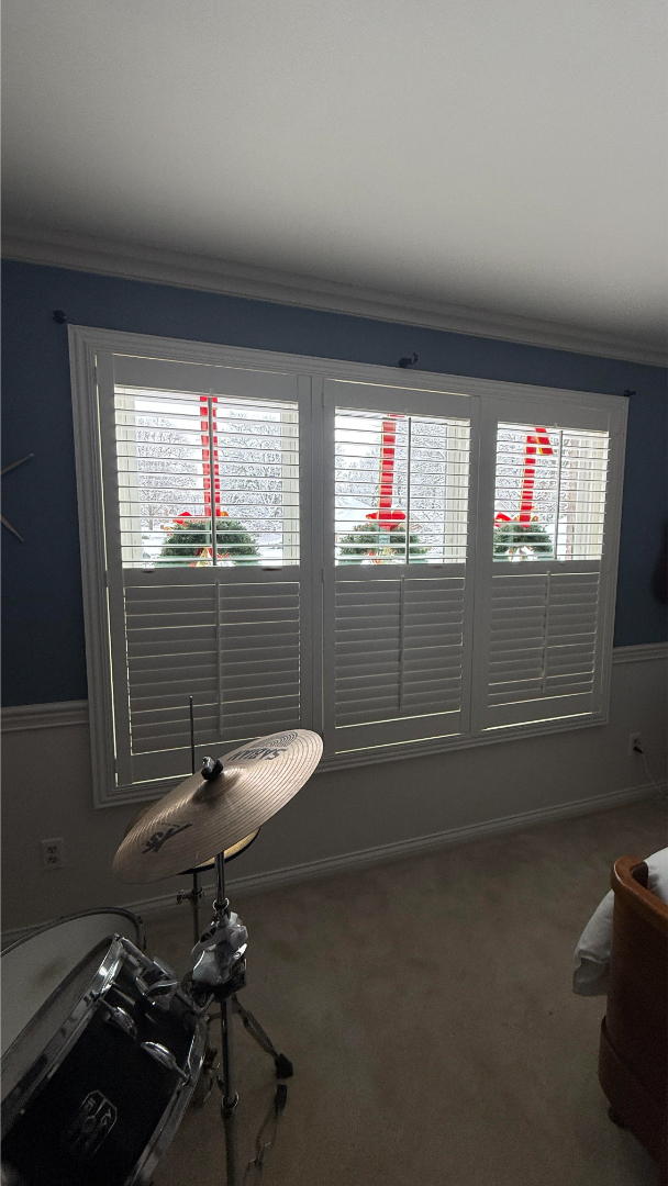 Interior plantation shutters installed on large windows by Simmonds Blinds and Drapes serving Alvaton, KY. Call (270) 550-1334.