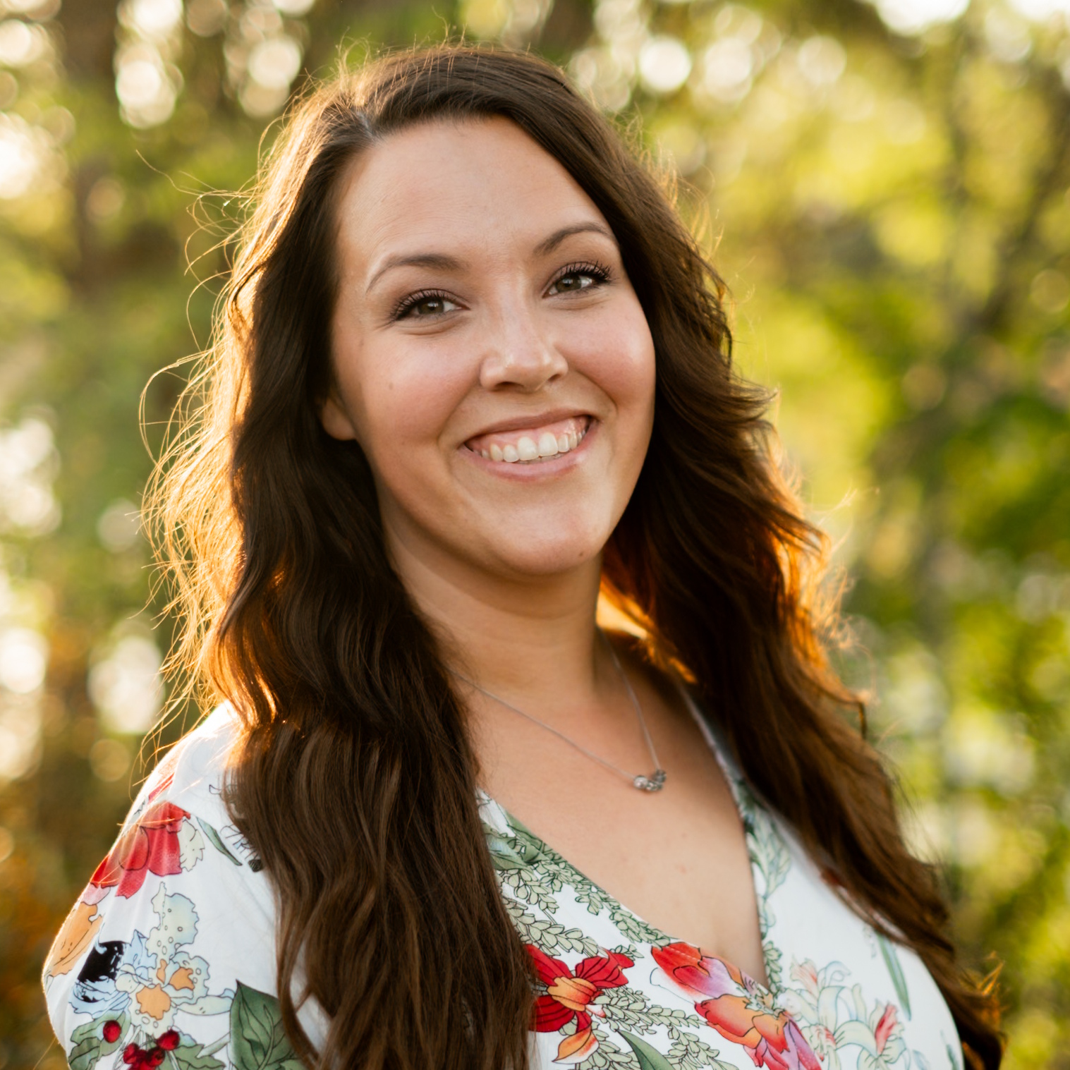 A woman is examining a man 's head in a lab