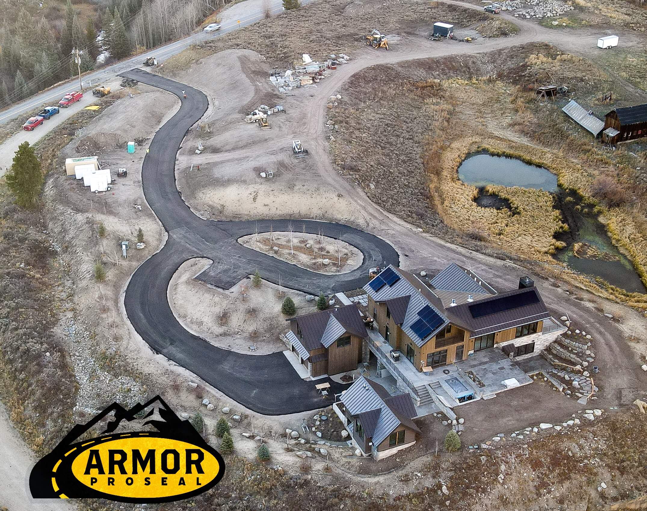 Newly completed residential driveway paving in Fruita, CO, showcasing Armor Proseal's smooth finish and expert installation that enhances property value and curb appeal.