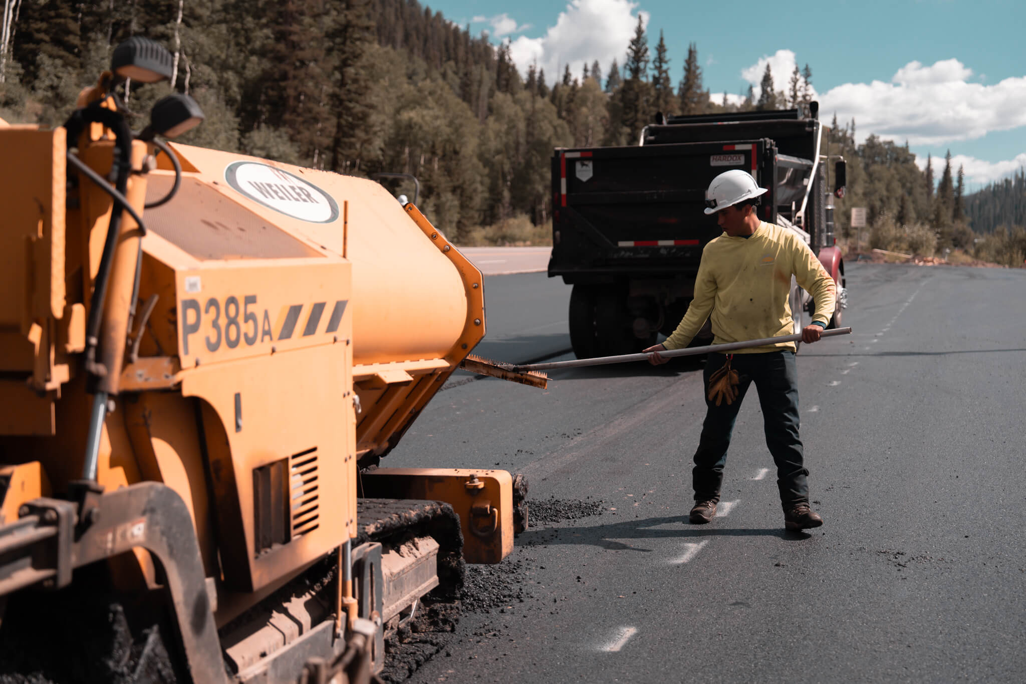 Armor Proseal crew installing a smooth asphalt access road at a Palisade, CO winery, enhancing visitor experience with professional paving that complements the agricultural setting.
