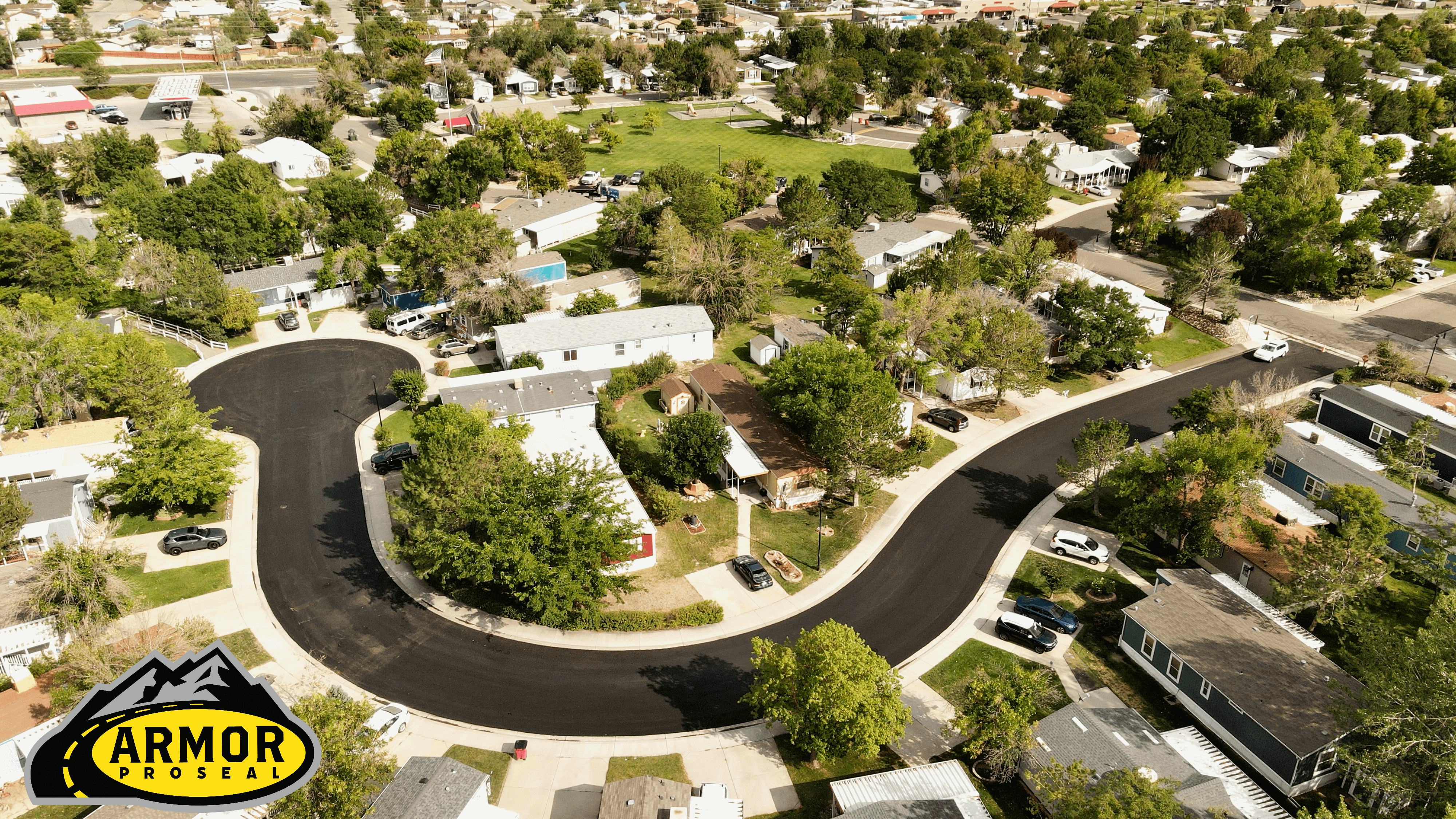 Municipal recreation area paving in Huntington, UT, showcasing Armor Proseal's contribution to community facilities with quality asphalt surfaces for public use.
