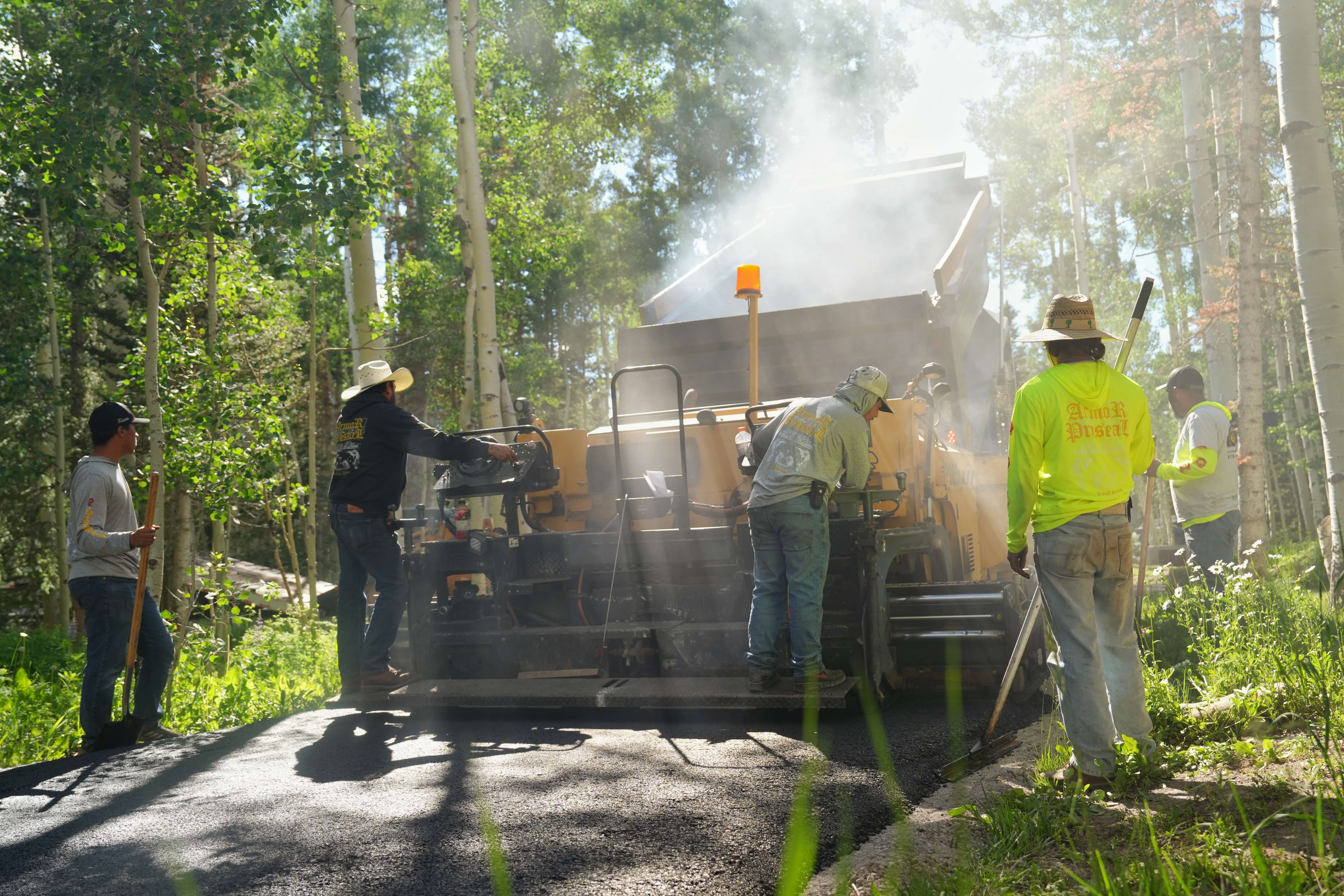 School parking area resurfacing project in Cedaredge, CO, with Armor Proseal crew creating safe, durable surfaces for educational facility infrastructure.