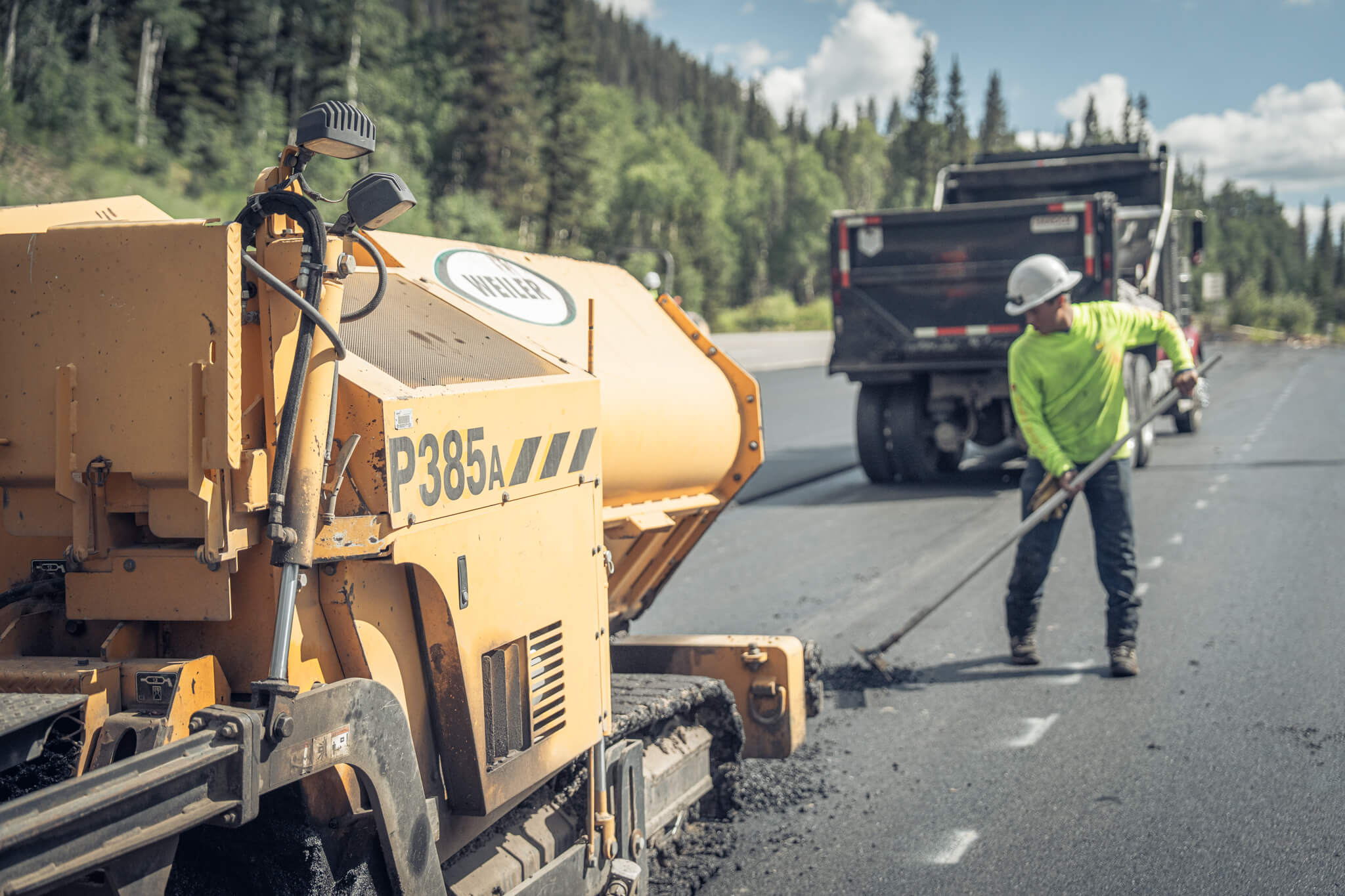 Municipal parking area resurfacing project in Carbondale, CO, with Armor Proseal equipment and crew creating durable surfaces that withstand mountain climate conditions.