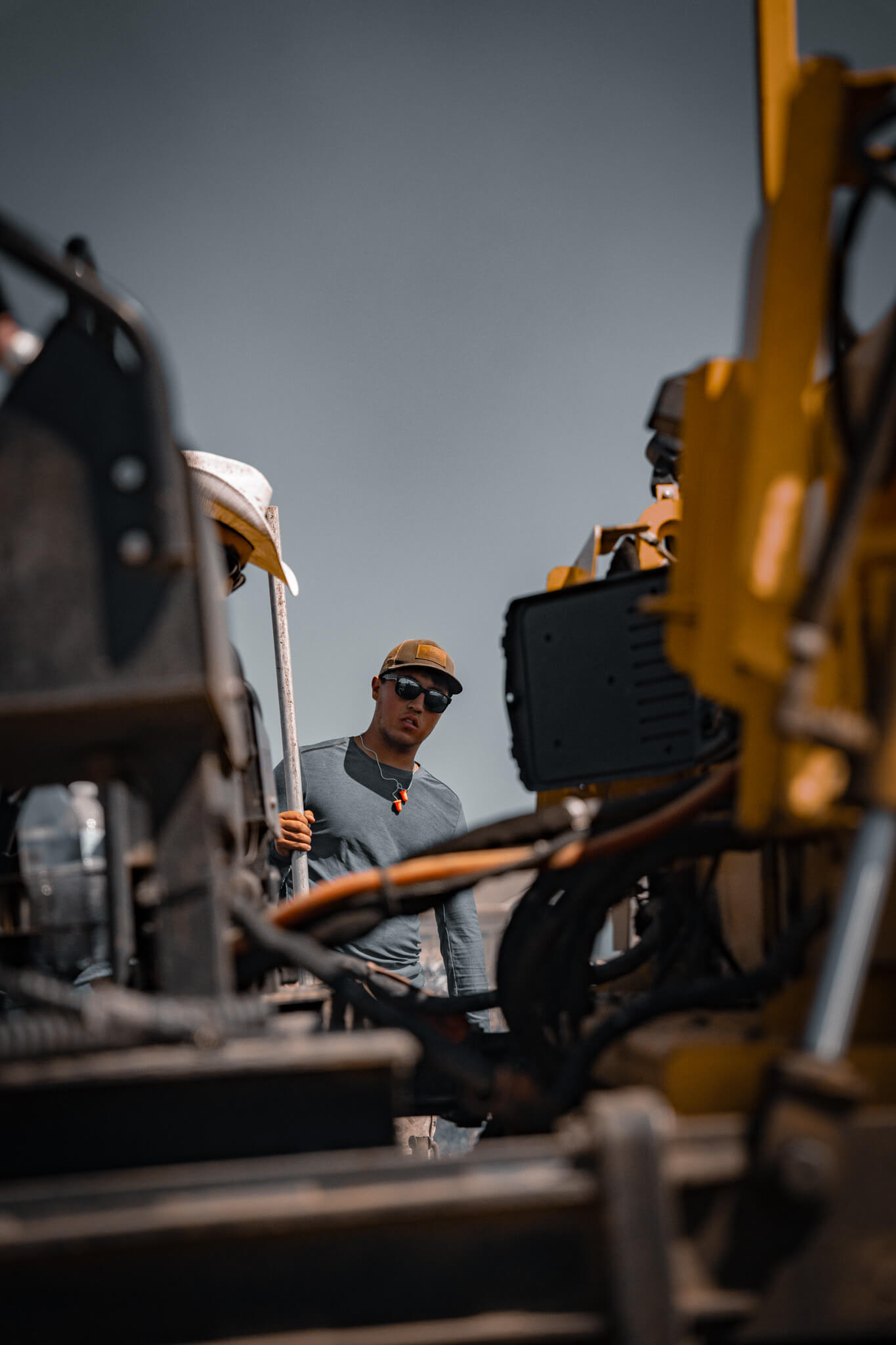Industrial access road installation in Crescent Junction, UT, showcasing Armor Proseal's expertise in creating heavy-duty asphalt surfaces for remote desert operations.