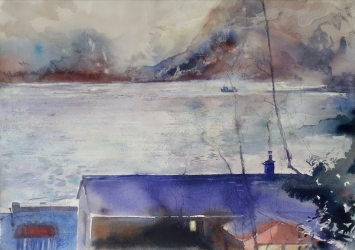 Cottage at the edge of the loch, early evening. Isle of Skye.