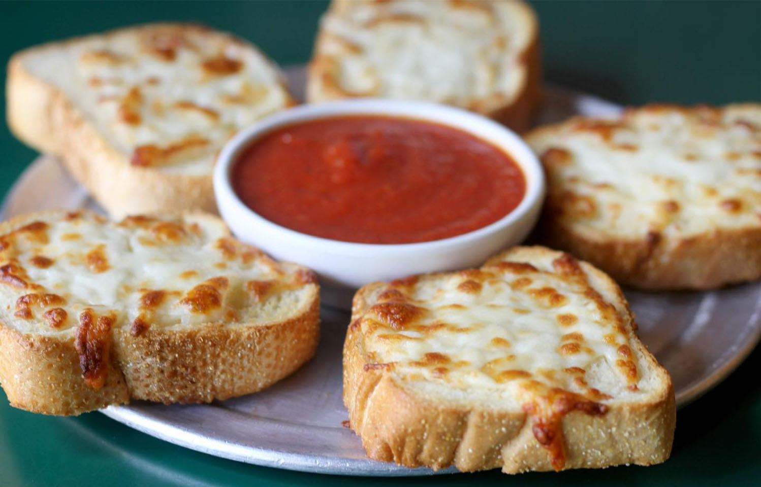 Choose your favorite toppings and appetizers at Shakespeare's in Columbia, MO.