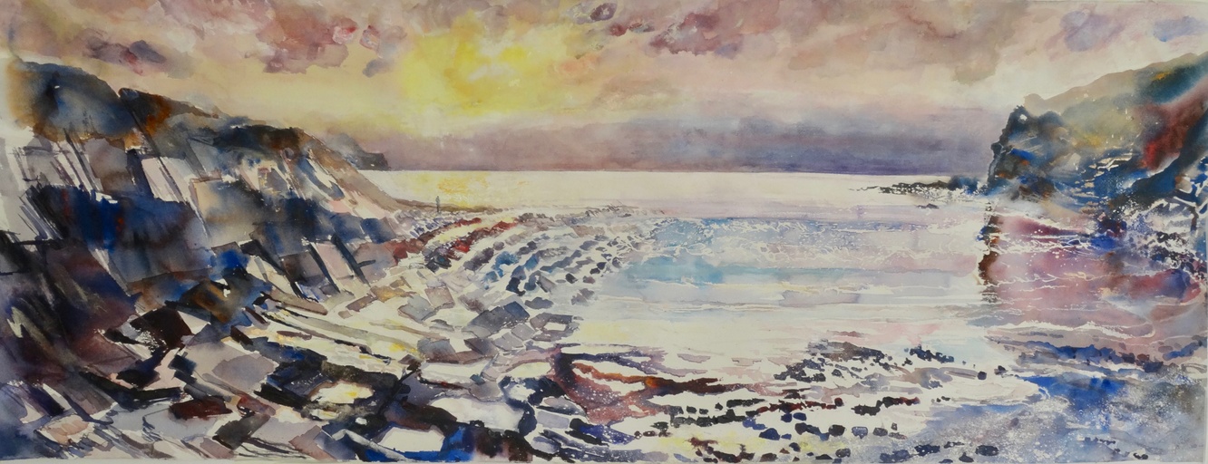 Sunlight on the rock pools with lone figure, Crackington Haven, Cornwall